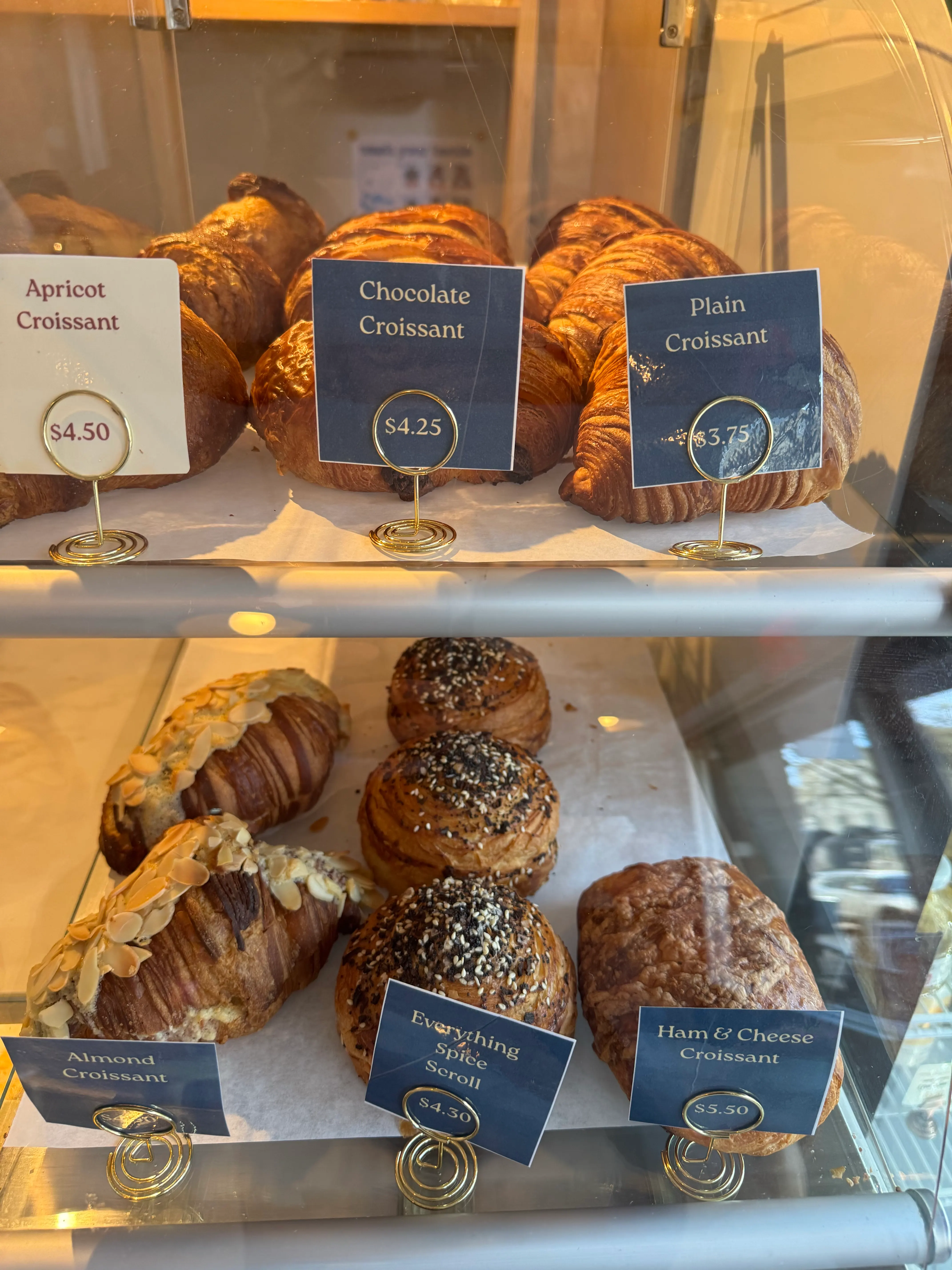Croissants and savory pastries in the Montemug pastry case
